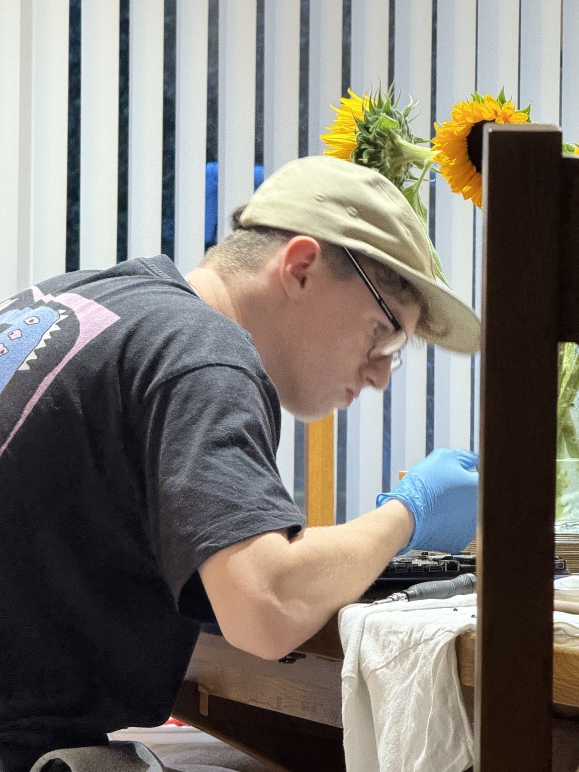 Morgan from PlymFix repairing a laptop in Plymouth